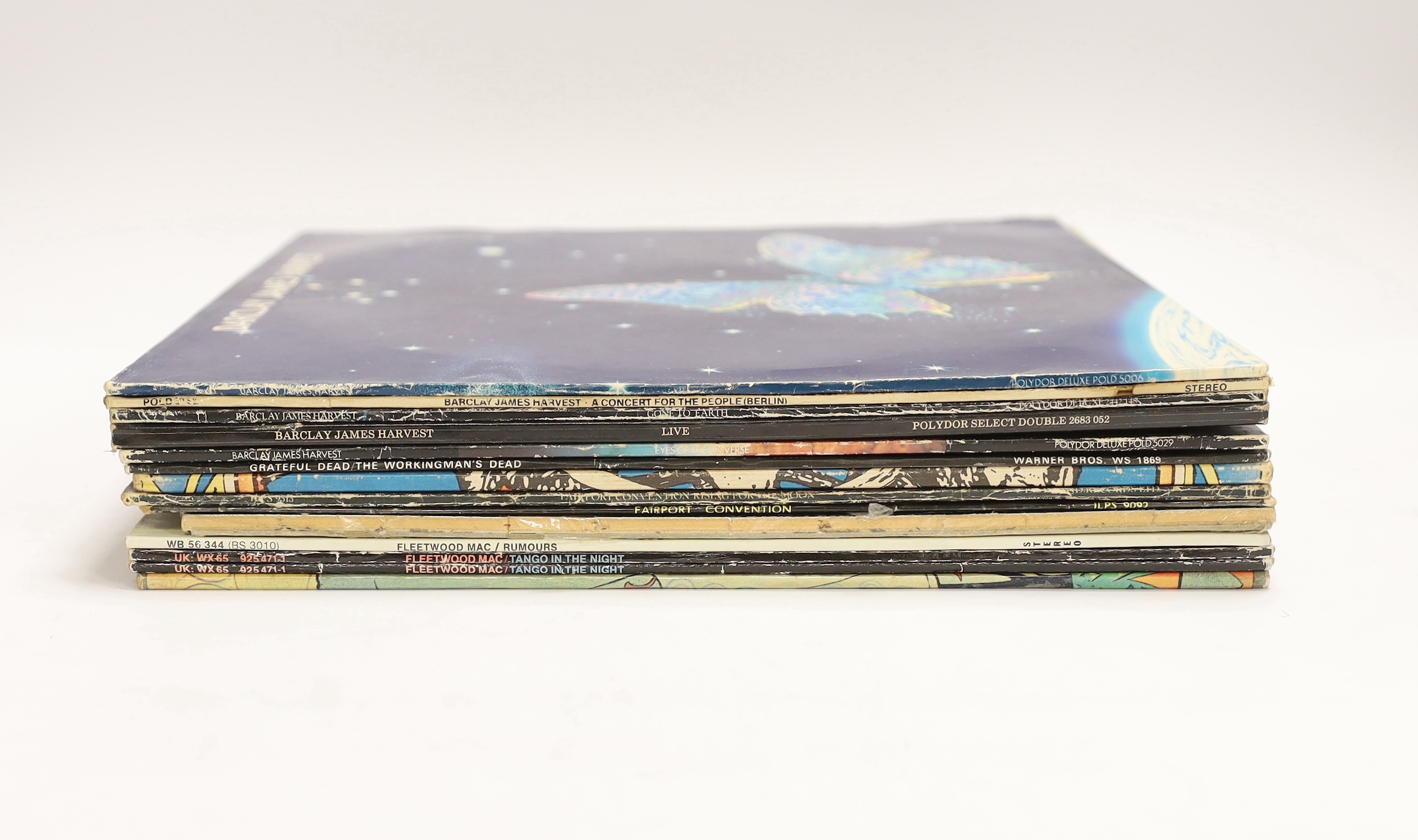 Thirteen LP record albums, artists include; Fleetwood Mac, Fairport Convention, Grateful Dead, and Barclay James Harvest, plus a Fleetwood Mac jigsaw